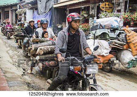 People hauling logs on motorbikes; Sapa, Lao Cai, Vietnam View Large Photo Image Stock Photograph - People hauling logs on motorbikes; Sapa, Lao Cai, Vietnam. Fotosearch