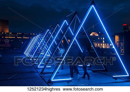 People walking along The Wave art installation; Copenhagen, Denmark View Large Photo Image Stock Photograph - People walking along The Wave art installation; Copenhagen, Denmark. Fotosearch