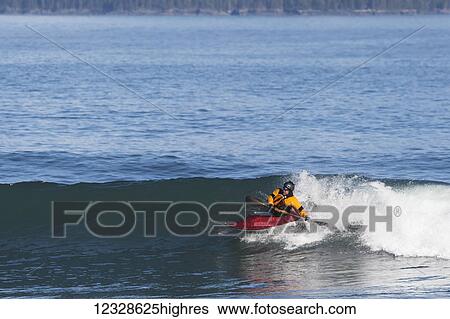 Person surf kayaking on the Kenai Peninsula Outer Coast, South-central Alaska; Alaska, United States of America View Large Photo Image Stock Photograph - Person surf kayaking on the Kenai Peninsula Outer Coast, South-central Alaska; Alaska, United States of America. Fotosearch