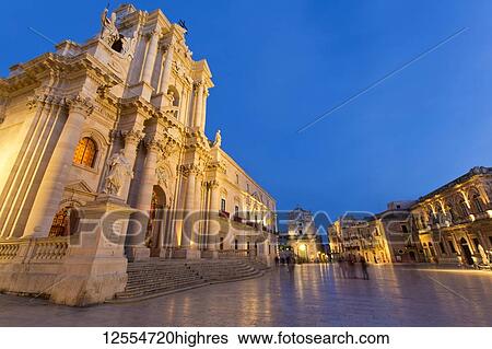 Stock Photograph - Piazza Duomo and Cathedral of Syracuse at dusk; Syracuse, Sicily, Ortigia, Italy. Fotosearch