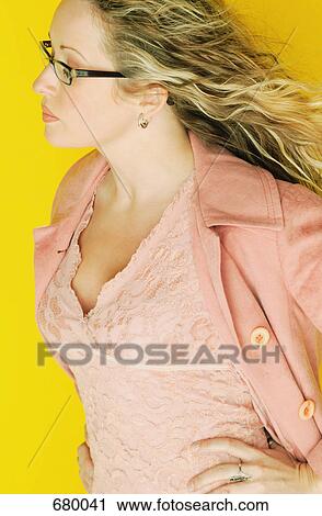 Stock Image - Pink lace dress and coat. Fotosearch