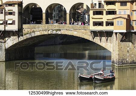Stock Photograph - Ponte Vecchio over the River Ar0; Florence, Tuscany, Italy. Fotosearch