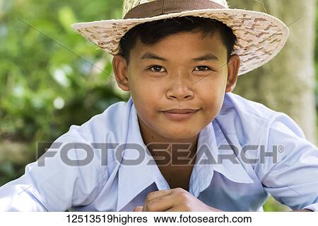 Portrait of a Cambodian boy, Sambor Prei Kuk; Kompong Thom, Cambodia View Large Photo Image Stock Photograph - Portrait of a Cambodian boy, Sambor Prei Kuk; Kompong Thom, Cambodia. Fotosearch