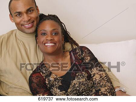 Stock Photo - Portrait of a happy couple. Fotosearch