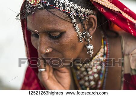 Stock Photograph - Portrait of a Hindu Indian woman; Jaisalmer, Rajasthan, India. Fotosearch