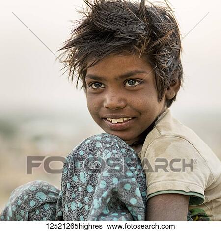 Portrait of a young boy; Jaisalmer, Rajasthan, India View Large Photo Image Stock Photograph - Portrait of a young boy; Jaisalmer, Rajasthan, India. Fotosearch