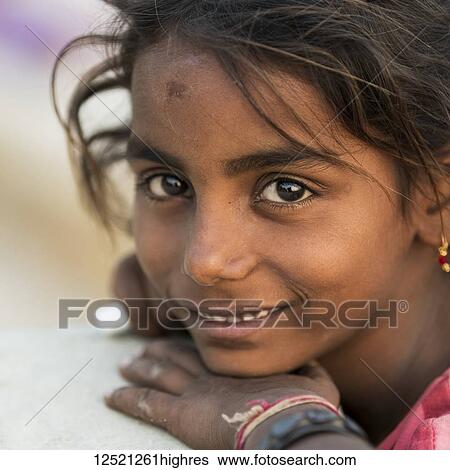 Stock Photograph - Portrait of a young Indian girl; Jaisalmer, Rajasthan, India. Fotosearch