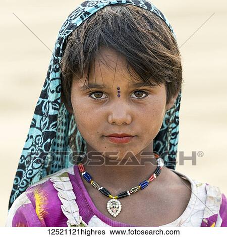 Portrait of a young Indian girl with markings on her face; Damodara, Rajasthan, India View Large Photo Image Stock Photograph - Portrait of a young Indian girl with markings on her face; Damodara, Rajasthan, India. Fotosearch