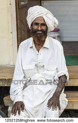 Portrait of an Indian man with turban; Jaisalmer, Rajasthan, India View Large Photo Image Stock Photograph - Portrait of an Indian man with turban; Jaisalmer, Rajasthan, India. Fotosearch