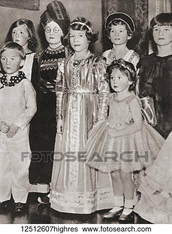 Stock Photograph - Princess Elizabeth of York, in Tudor Gown and Princess Margaret in fairy costume, at a fancy dress party in 1934. Princess Elizabeth of York, future Elizabeth II, born 1926. Queen of the United Kingdom. Princess Margaret, future Countess of.... Fotosearch