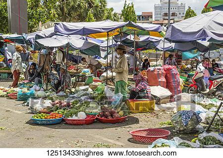 Produce vendors outside the Central Market Hall; Phnom Penh, Cambodia View Large Photo Image Stock Photograph - Produce vendors outside the Central Market Hall; Phnom Penh, Cambodia. Fotosearch