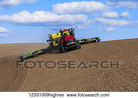 Quadtrac Tractor Seeding Garbanzo Beans In The Palouse Region Of Eastern Washington; Washington, United States Of America View Large Photo Image Stock Photograph - Quadtrac Tractor Seeding Garbanzo Beans In The Palouse Region Of Eastern Washington; Washington, United States Of America. Fotosearch