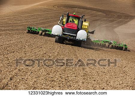 Quadtrac Tractor Seeding Garbanzo Beans In The Palouse Region Of Eastern Washington; Washington, United States Of America View Large Photo Image Stock Photograph - Quadtrac Tractor Seeding Garbanzo Beans In The Palouse Region Of Eastern Washington; Washington, United States Of America. Fotosearch