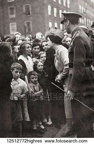 Stock Photograph - Queen Elizabeth visiting the people of London during World War Two. Queen Elizabeth, The Queen Mother. Elizabeth Angela Marguerite Bowes-Lyon, 1900 2002. Wife of King George VI and mother of Queen Elizabeth II.. Fotosearch