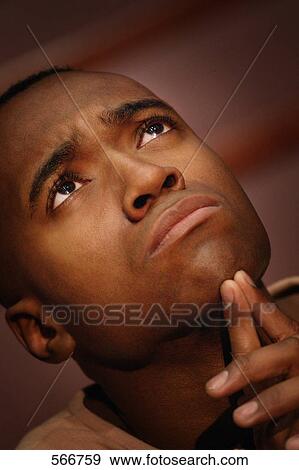 Stock Photo - Questioning. Fotosearch
