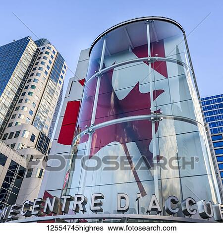 Stock Photograph - Red maple leaf art installation on sign; Vancouver, British Columbia, Canada. Fotosearch
