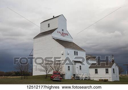 Stock Photograph - Restored grain elevator in a Saskatchewan prairie town; Val Marie, Saskatchewan, Canada. Fotosearch