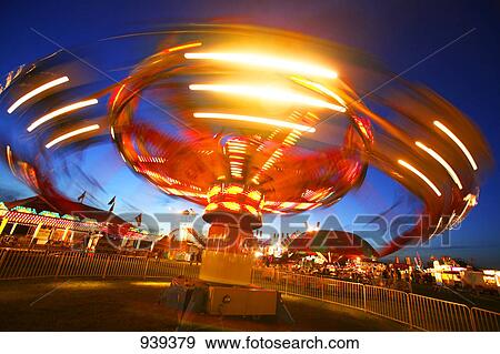 Stock Photo - Ride at an amusement park. Fotosearch