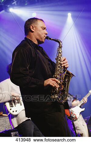 Sax player in concert View Large Photo Image Stock Photo - Sax player in concert. Fotosearch