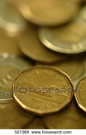 Scattered change View Large Photo Image Stock Photo - Scattered change. Fotosearch