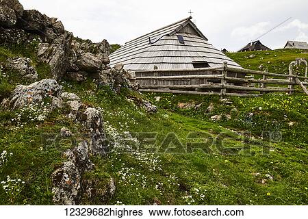 Stock Photograph - Shepherd Huts In The Kamniksavinja Alps; Slovenia. Fotosearch