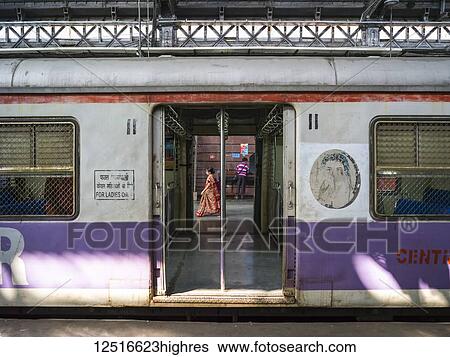 Stock Photograph - Sign on a train's passenger car saying 'for ladies only'; Mumbai, Maharashtra, India. Fotosearch