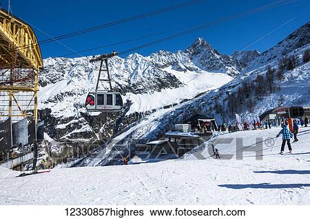 Skiers At A Ski Resort, Aiguille Ges Grands Montets; Chamonix, France View Large Photo Image Stock Photograph - Skiers At A Ski Resort, Aiguille Ges Grands Montets; Chamonix, France. Fotosearch