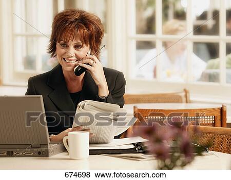 Stock Photo - Smiling phone call. Fotosearch