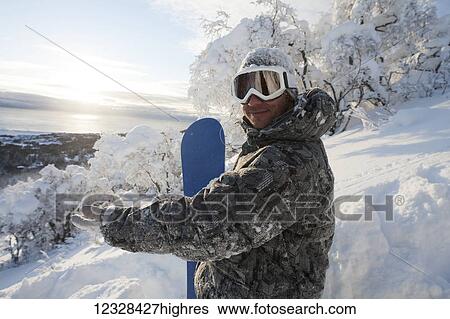 Snowboarder on a hillside at sunset, Homer, Southcentral Alaska, USA View Large Photo Image Stock Photograph - Snowboarder on a hillside at sunset, Homer, Southcentral Alaska, USA. Fotosearch