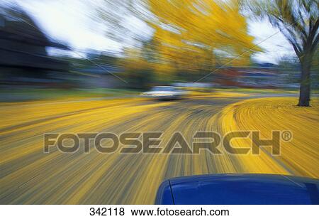 Speeding down a road in autumn View Large Photo Image Stock Photo - Speeding down a road in autumn. Fotosearch