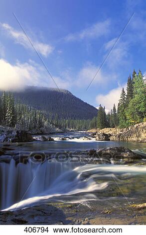 Spring time waterfall View Large Photo Image Picture - Spring time waterfall. Fotosearch