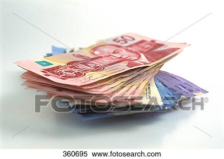 Stack of Canadian money View Large Photo Image Stock Photography - Stack of Canadian money. Fotosearch