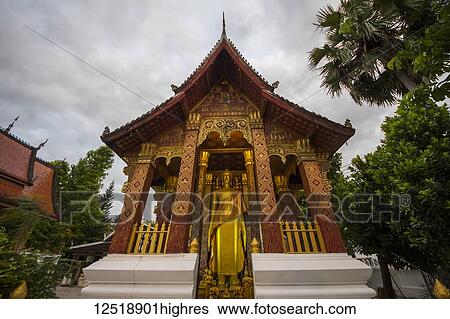Standing buddha statue at Wat Sen; Luang Prabang, Laos View Large Photo Image Stock Photograph - Standing buddha statue at Wat Sen; Luang Prabang, Laos. Fotosearch