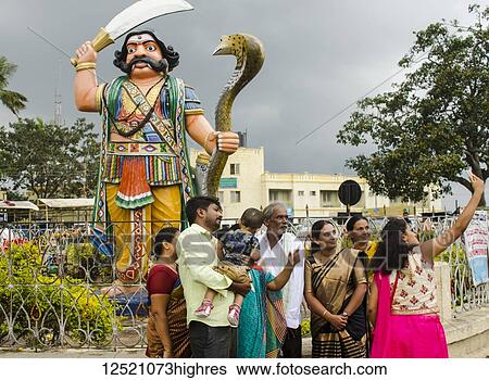 Stock Photograph - Statue of Mahishasura, buffalo demon, Chamundi Hills; Mysore, Karnataka, India. Fotosearch