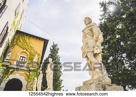 Stock Photograph - Statues at Duino Castle; Trieste, Friuli Venezia Giulia, Italy. Fotosearch