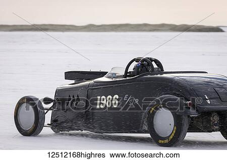 Stock Photograph - Street Roadster Class E/STR, a 1934 Ford Roadster with 256 Dart V-8 at speed in try for 214. 202 mph record on Bonneville Salt Flats during Bonneville Speed Week 2017.; Wendover, Utah, United States of America. Fotosearch
