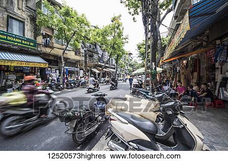 Stock Photograph - Street scene in the Old Quarter; Hanoi, Vietnam. Fotosearch