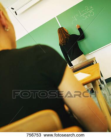 Student at chalkboard View Large Photo Image Stock Image - Student at chalkboard. Fotosearch