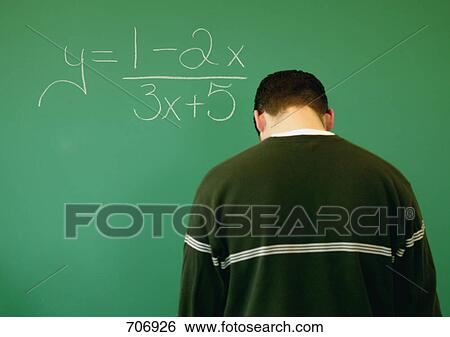 Student at the chalk board View Large Photo Image Stock Photograph - Student at the chalk board. Fotosearch