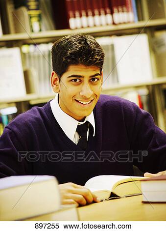 Student studying in library View Large Photo Image Stock Photography - Student studying in library. Fotosearch