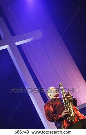 Stock Photo - Sunday sax solo. Fotosearch