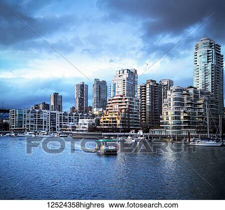 Sunset over Yaletown with boats in the harbour; Vancouver, British Columbia, Canada View Large Photo Image Stock Photograph - Sunset over Yaletown with boats in the harbour; Vancouver, British Columbia, Canada. Fotosearch