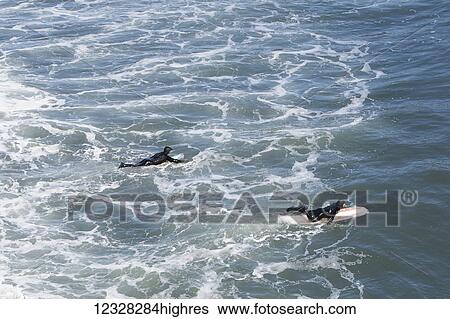 Surfers With Surfboards Enter The Waters Of The Kenai Peninsula Outer Coast, Southcentral Alaska, USA View Large Photo Image Stock Photograph - Surfers With Surfboards Enter The Waters Of The Kenai Peninsula Outer Coast, Southcentral Alaska, USA. Fotosearch