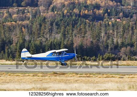 Stock Photograph - Swenson Myron B Pa-12 Super Cruiser, Homer Airport, Southcentral Alaska, USA. Fotosearch