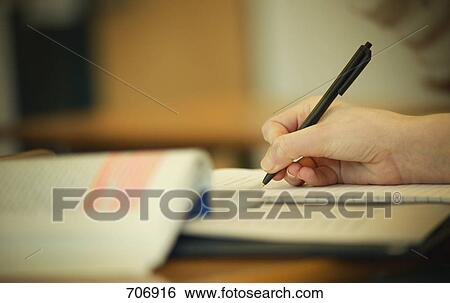 Taking notes in class View Large Photo Image Stock Photograph - Taking notes in class. Fotosearch