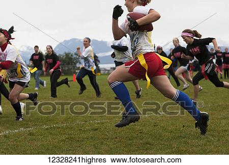 Teen Girls Playing Powderpuff Football, Alaska, USA View Large Photo Image Stock Photograph - Teen Girls Playing Powderpuff Football, Alaska, USA. Fotosearch