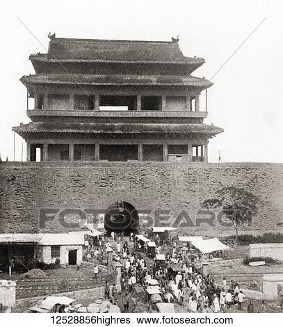 Stock Photograph - The Chongwenmen Gate aka Hata-Men, Hadamen or Hademen, a gate that was once part of Beijing's city wall, seen here at the start of the 20th century before its demolition in the 1960's. From The Wonders of the World, published c. 1920.. Fotosearch