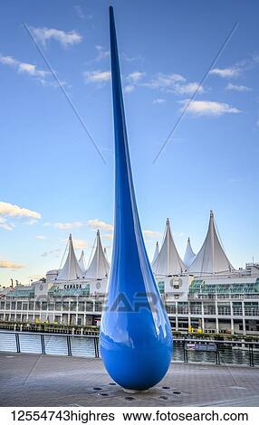 The Drop, raindrop steel sculpture at the waterfront with Canada Place in the background; Vancouver, British Columbia, Canada View Large Photo Image Stock Photograph - The Drop, raindrop steel sculpture at the waterfront with Canada Place in the background; Vancouver, British Columbia, Canada. Fotosearch