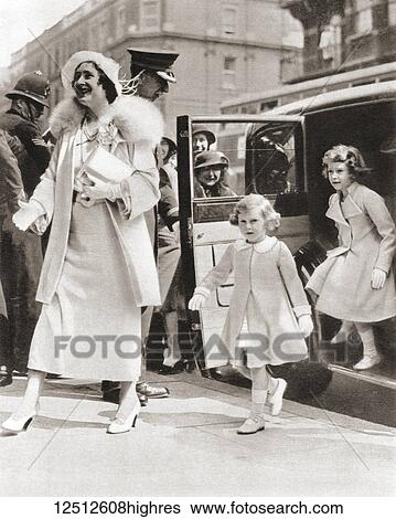 Stock Photograph - The Duchess of York arriving at the Royal Tournament at Olympia in 1935 with her daughters Princess Margaret, left and Princess Elizabeth, right. Duchess of York, future Queen Elizabeth, The Queen Mother. Elizabeth Angela Marguerite Bowes-Lyon, 1900.... Fotosearch