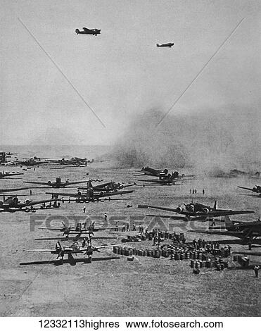 The Illustrated London News 1941. World war II. A German desert aerodrome. Junkers, Troop-Carriers and Messerschmitt fighters lined up in Libya View Large Photo Image Stock Photograph - The Illustrated London News 1941. World war II. A German desert aerodrome. Junkers, Troop-Carriers and Messerschmitt fighters lined up in Libya. Fotosearch